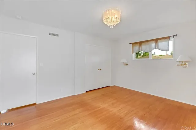 a view of empty room with a window