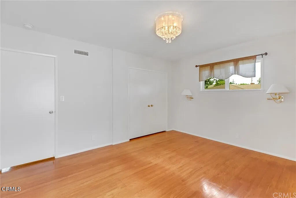 303 East Las Flores Avenue Arcadia, CA 91006 - Photo 28 of 37 a view of empty room with a window