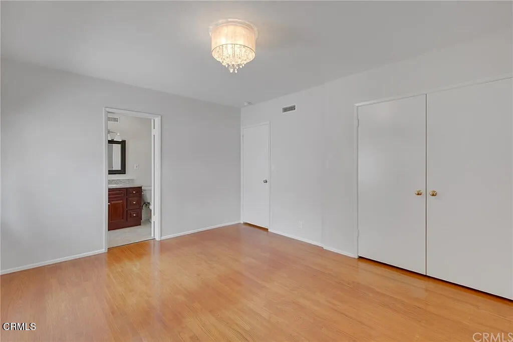 303 East Las Flores Avenue Arcadia, CA 91006 - Photo 29 of 37 a view of an empty room with a window