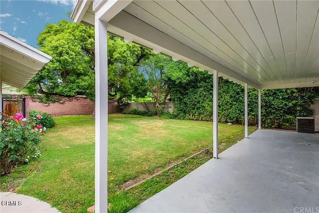 a house view with a garden space