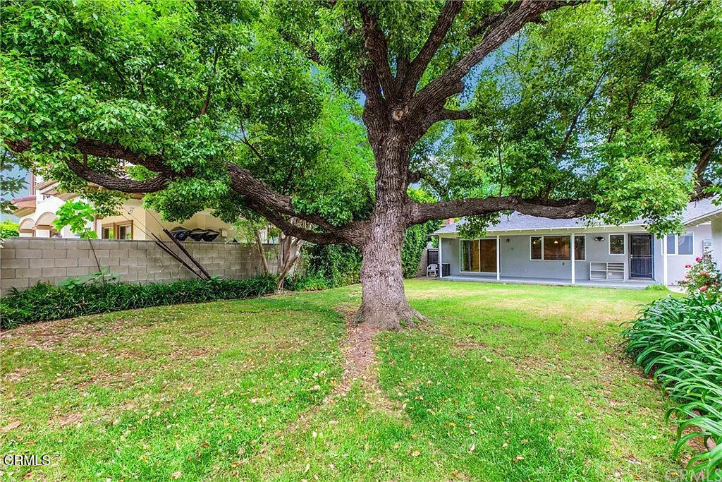 303 East Las Flores Avenue Arcadia, CA 91006 - Photo 37 of 37 a front view of a house with garden