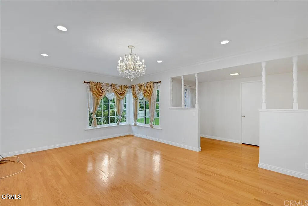 303 East Las Flores Avenue Arcadia, CA 91006 - Photo 6 of 37 a view of an empty room with a window