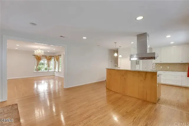 a view of kitchen and front door