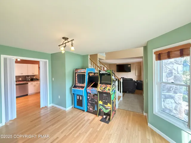 a bedroom with furniture and a window