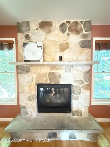 a fireplace with wooden floor