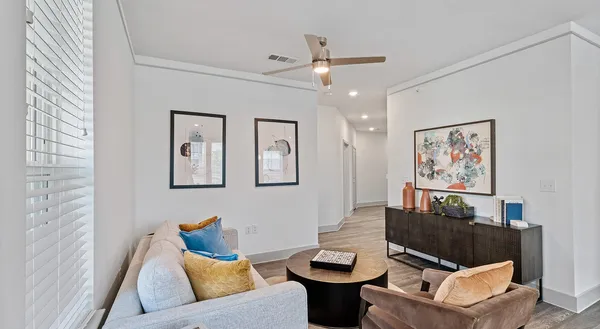 a living room with furniture and a window