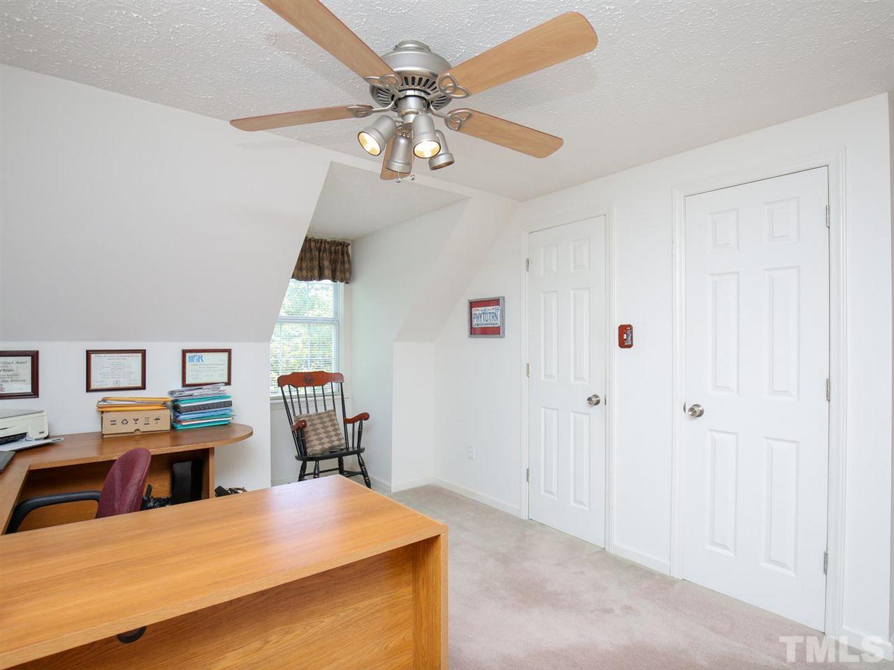 4040 Pine Ridge Road Franklinton, NC 27525 - Photo 17 of 30 a view of a kitchen with microwave and furniture