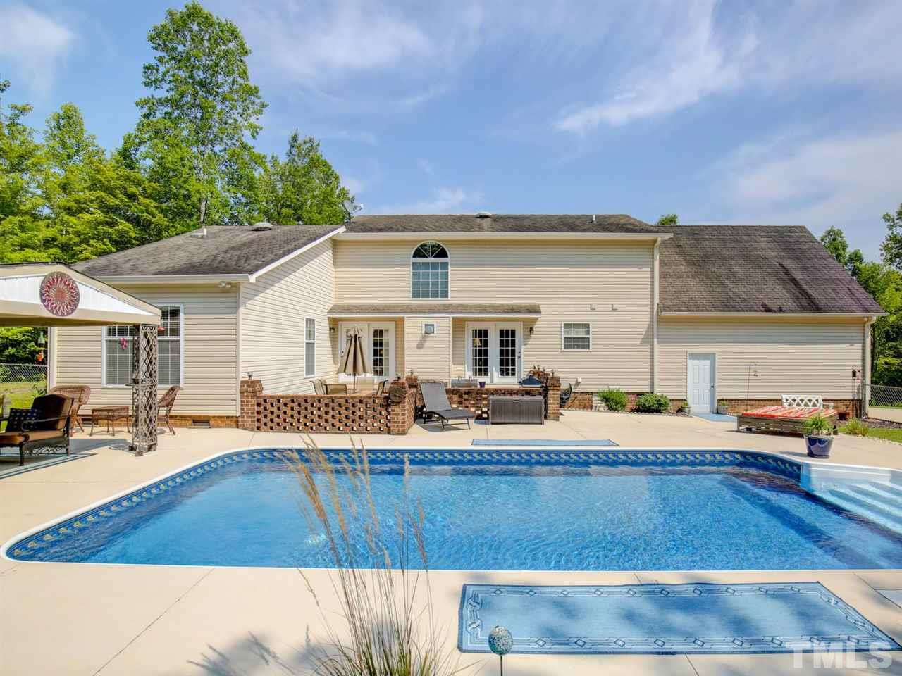 4040 Pine Ridge Road Franklinton, NC 27525 - Photo 22 of 30 a view of a house with outdoor space and sitting area