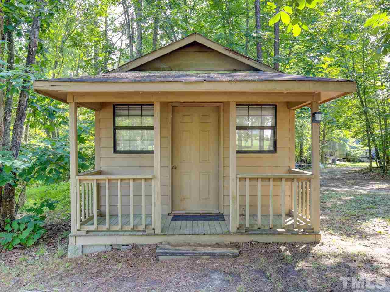 4040 Pine Ridge Road Franklinton, NC 27525 - Photo 29 of 30 a front view of a house with a yard