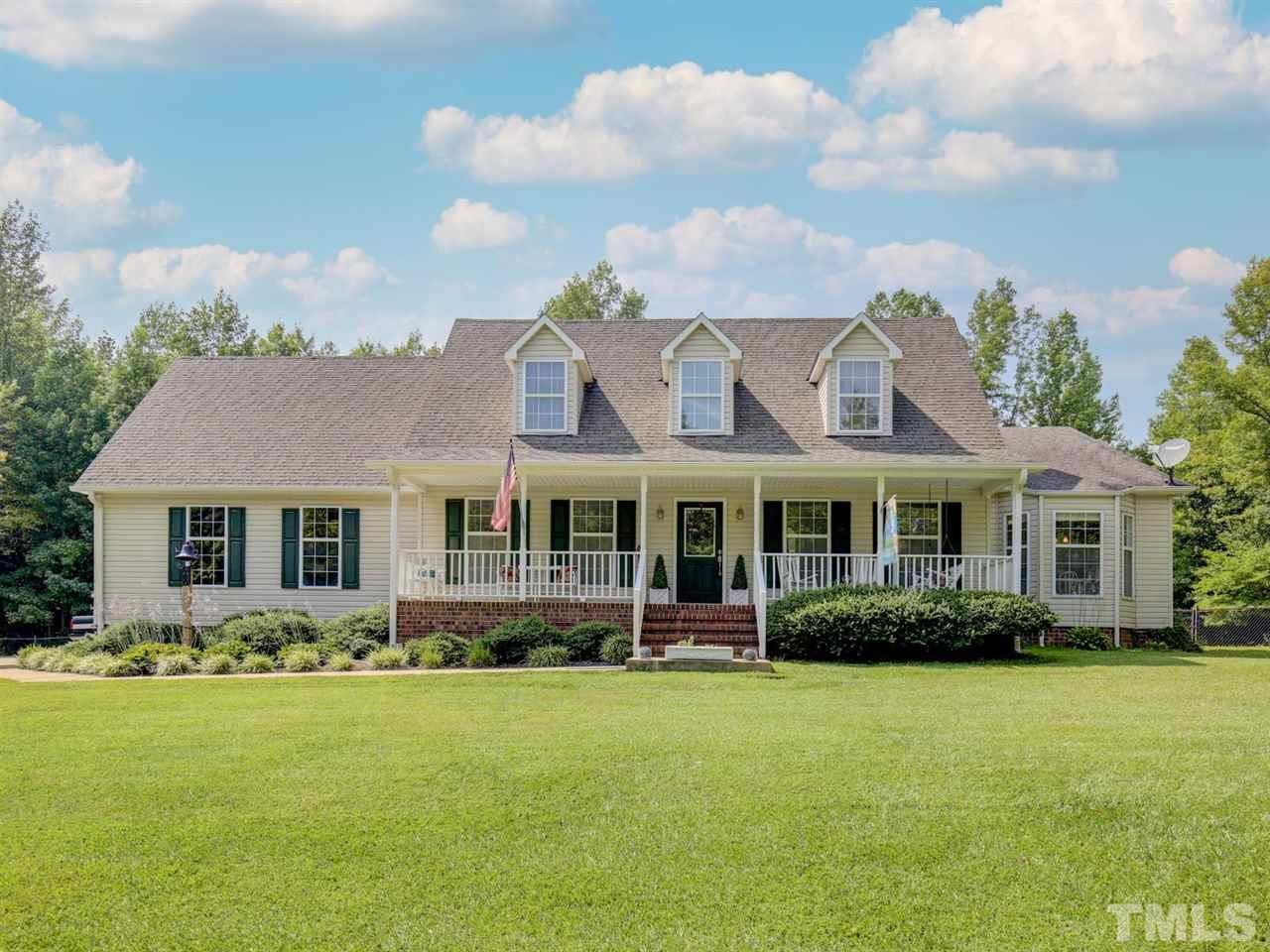 4040 Pine Ridge Road Franklinton, NC 27525 - Photo 4 of 30 a front view of house with yard and green space