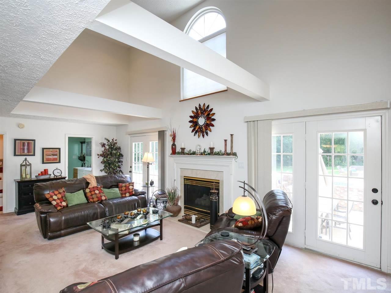 4040 Pine Ridge Road Franklinton, NC 27525 - Photo 5 of 30 a living room with furniture and a fireplace
