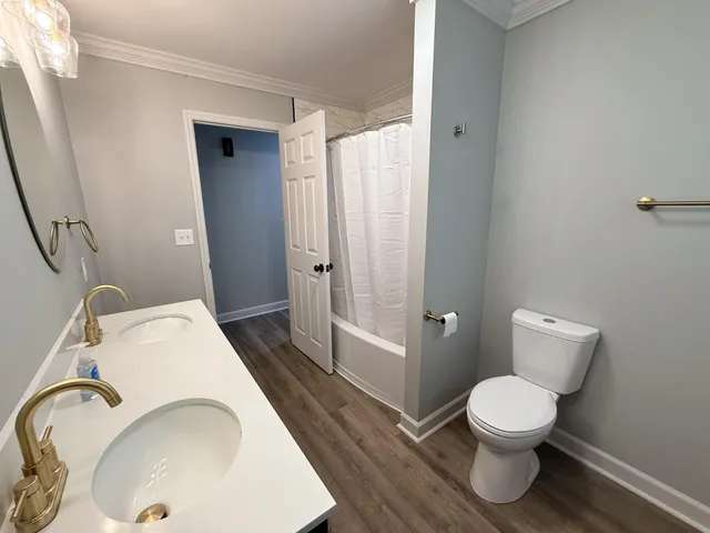 a bathroom with a sink and toilet