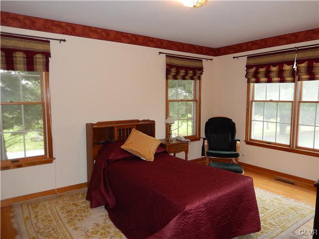 2764 Lapp Road Allentown, PA 18104 - Photo 11 of 27 a bedroom with a bed and a window
