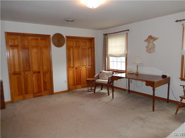 2764 Lapp Road Allentown, PA 18104 - Photo 12 of 27 a living room with furniture and a window