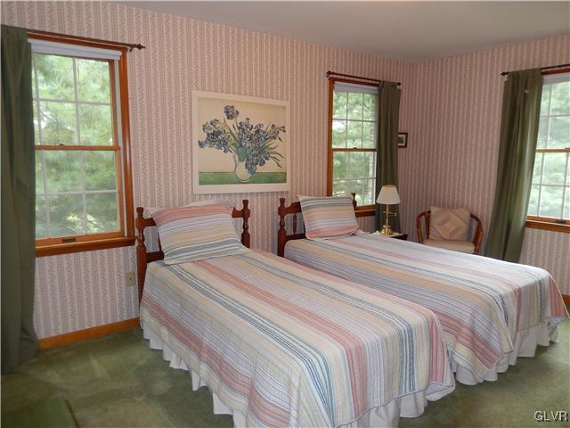 2764 Lapp Road Allentown, PA 18104 - Photo 14 of 27 a bedroom with a bed and a large window