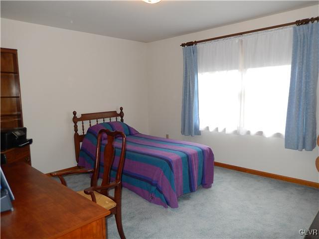 2764 Lapp Road Allentown, PA 18104 - Photo 15 of 27 a bedroom with a bed and a window