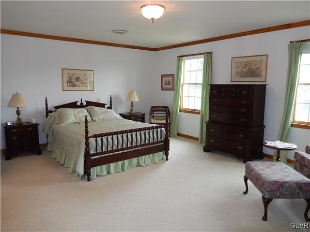 2764 Lapp Road Allentown, PA 18104 - Photo 17 of 27 a bedroom with a bed and a window
