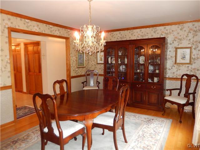 2764 Lapp Road Allentown, PA 18104 - Photo 7 of 27 a dining room with furniture a chandelier and window