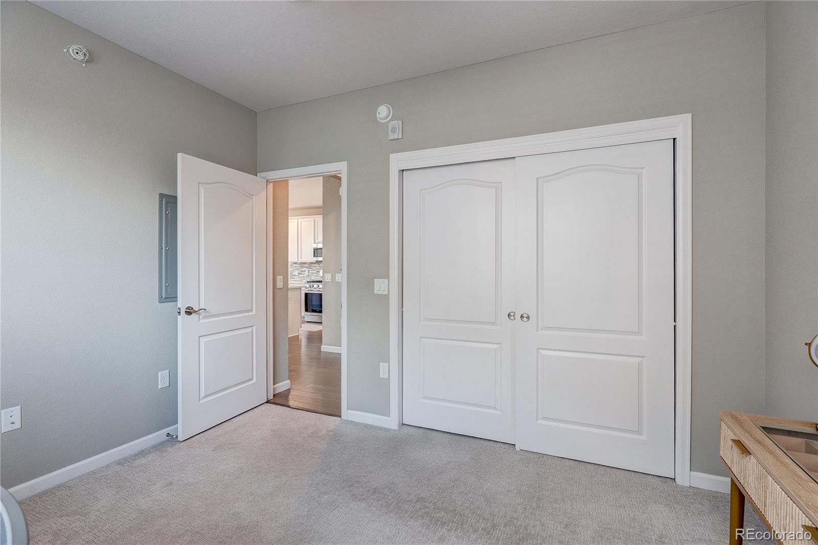 4777 Copeland Circle, Unit 204 Highlands Ranch, CO 80126 - Photo 23 of 39 an empty room with windows and closet