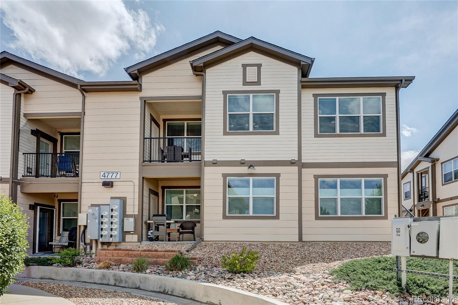 4777 Copeland Circle, Unit 204 Highlands Ranch, CO 80126 - Photo 27 of 39 front view of a brick house