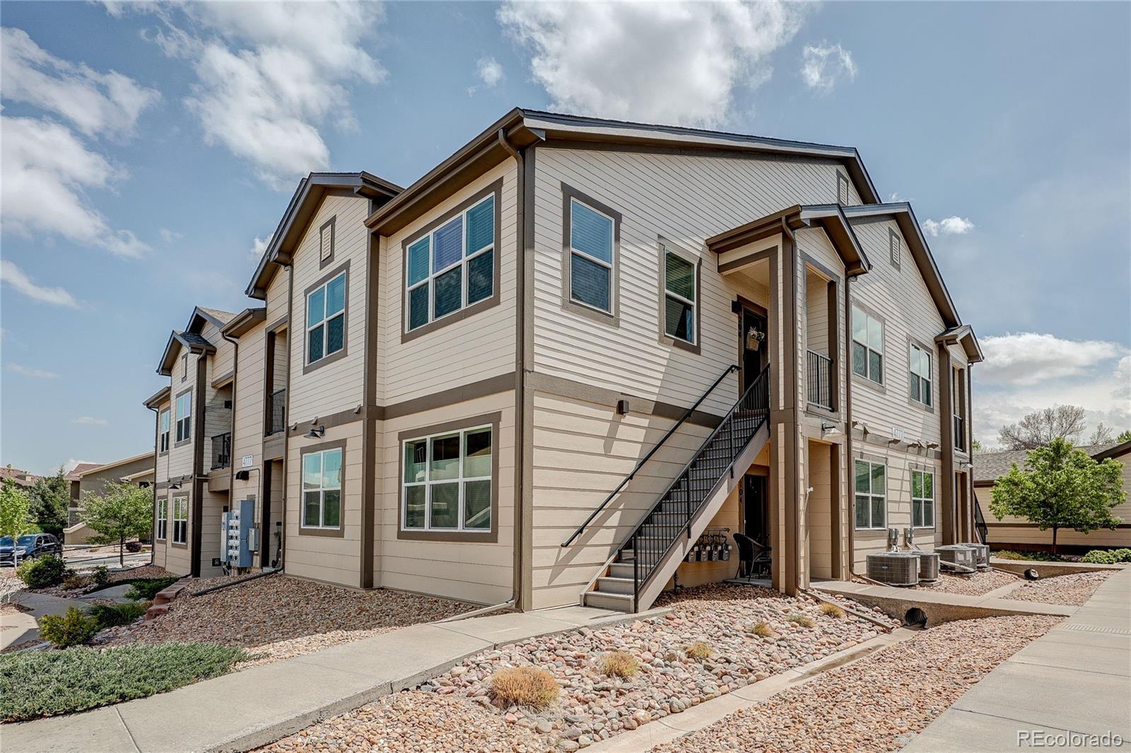 4777 Copeland Circle, Unit 204 Highlands Ranch, CO 80126 - Photo 28 of 39 a front view of a house