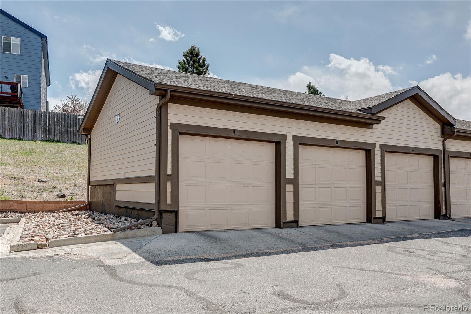 4777 Copeland Circle, Unit 204 Highlands Ranch, CO 80126 - Photo 30 of 39 a view of entryway with a wooden fence