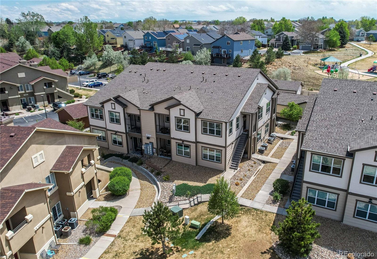 4777 Copeland Circle, Unit 204 Highlands Ranch, CO 80126 - Photo 36 of 39 an aerial view of a house with a big yard