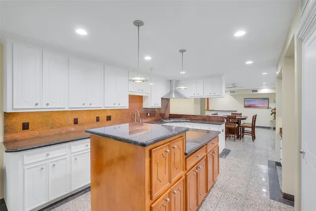 a kitchen with lot of counter top space
