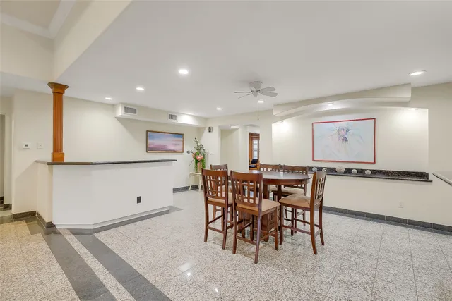 a view of a a dining room with furniture