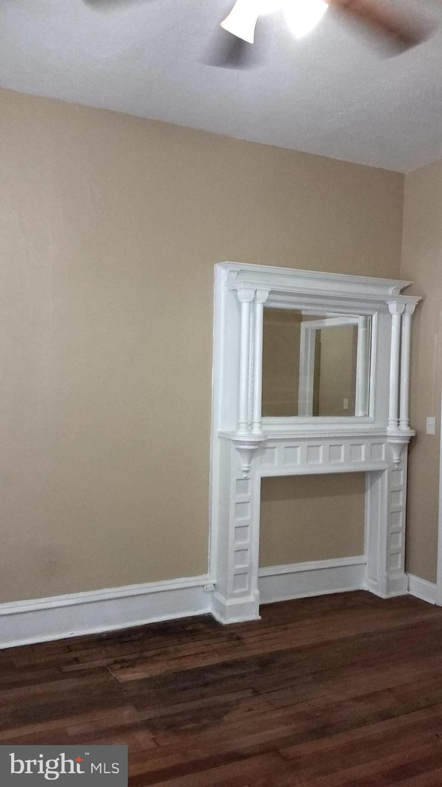 310 South 12th Street, Unit 1F Philadelphia, PA 19107 - Photo 9 of 12 a room with a fireplace