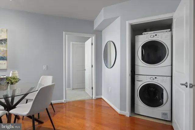 a view of a hallway with washer and dryer