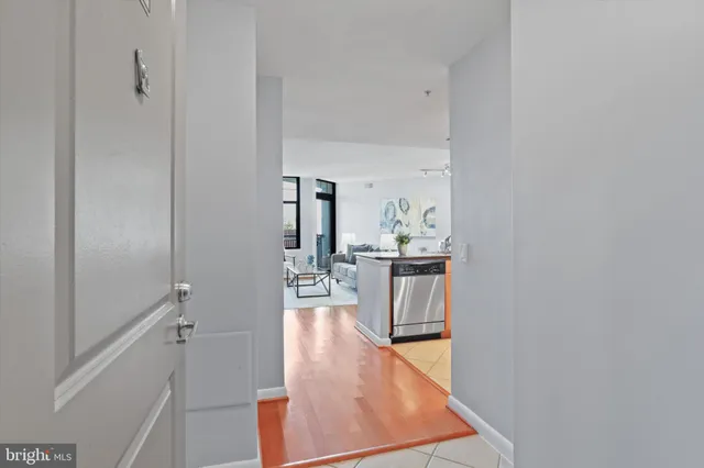 a view of a kitchen from the hallway