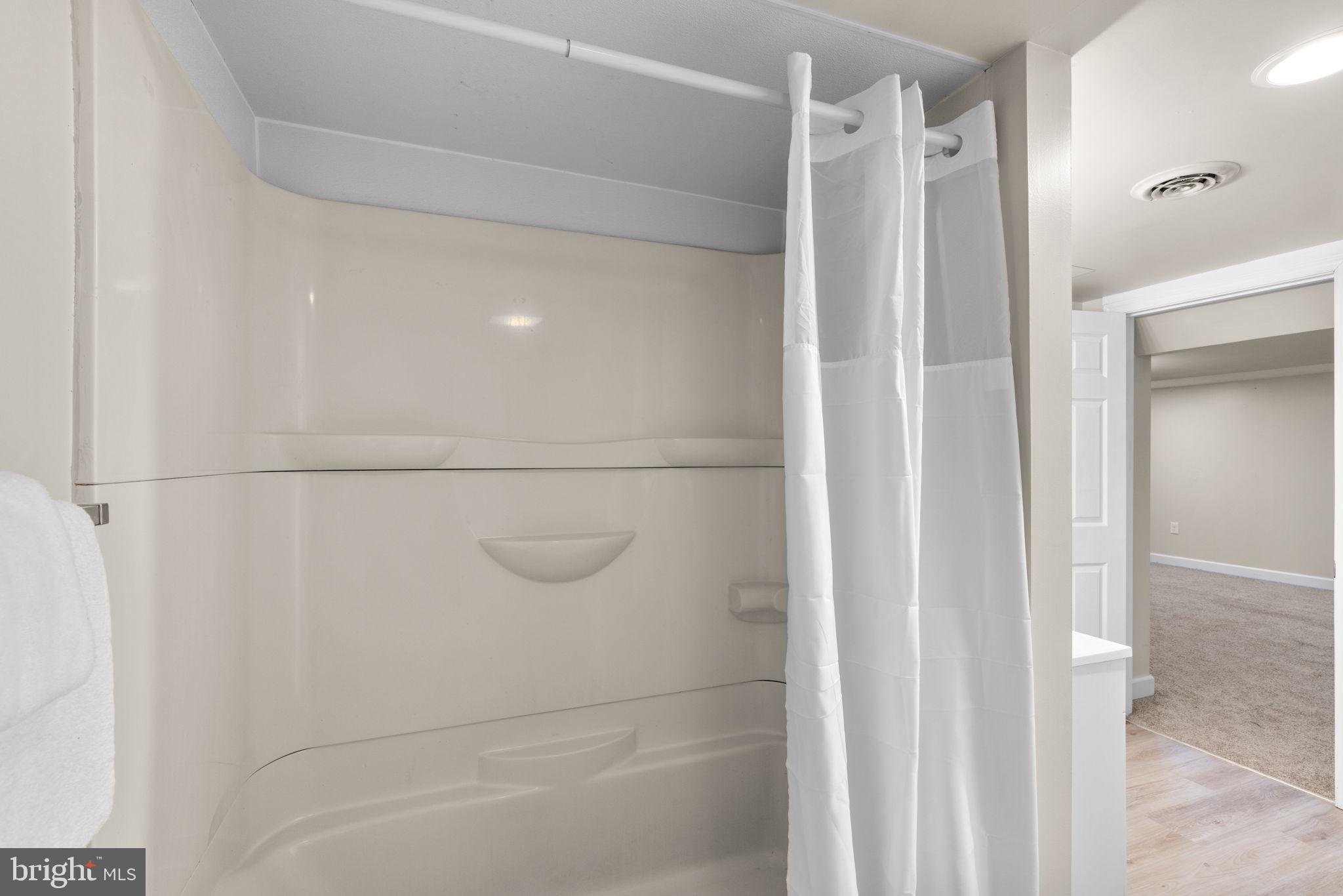 1221 Berkwood Road Baltimore, MD 21237 - Photo 26 of 34 a bathroom with a shower