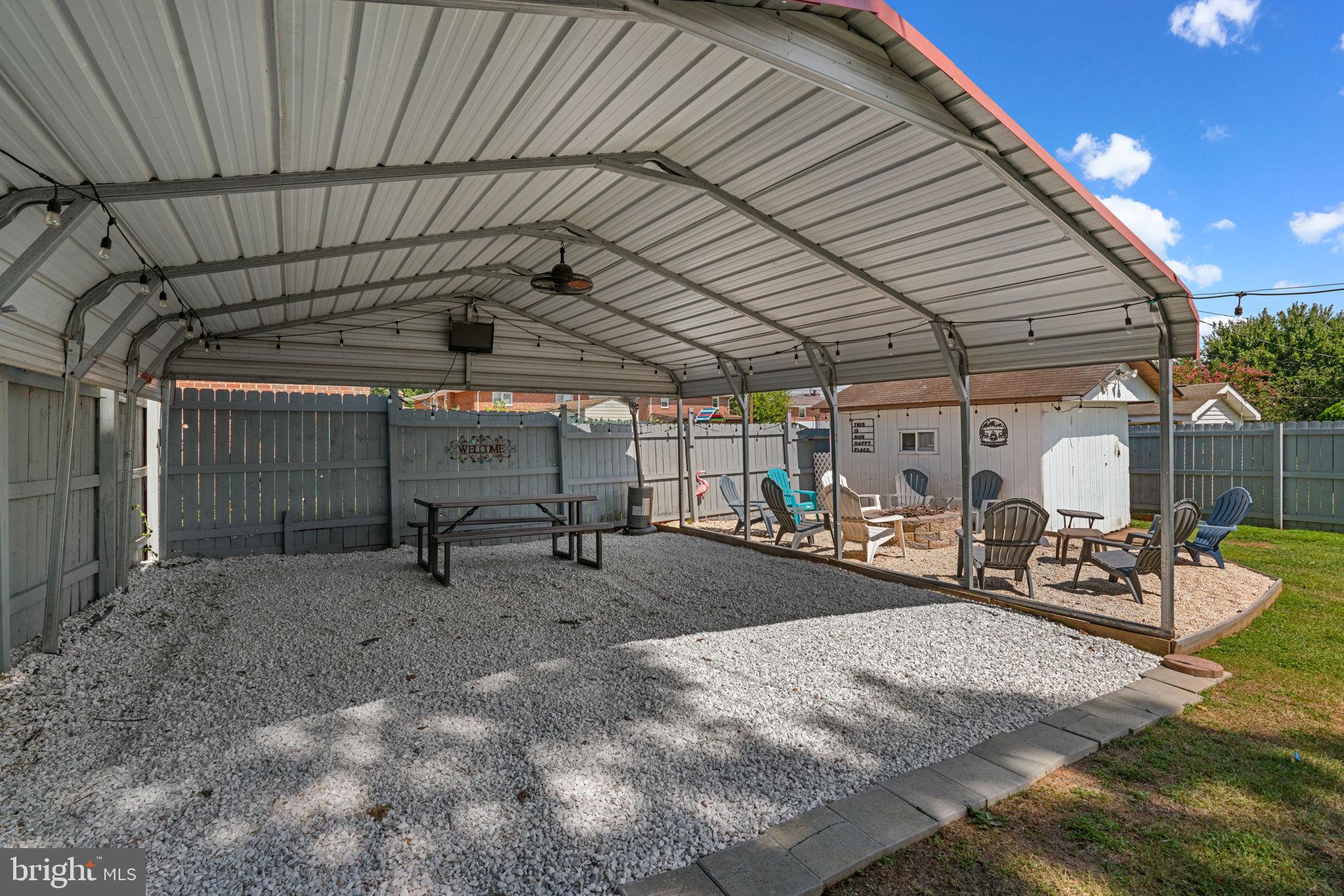 1221 Berkwood Road Baltimore, MD 21237 - Photo 32 of 34 a view of a garage with table