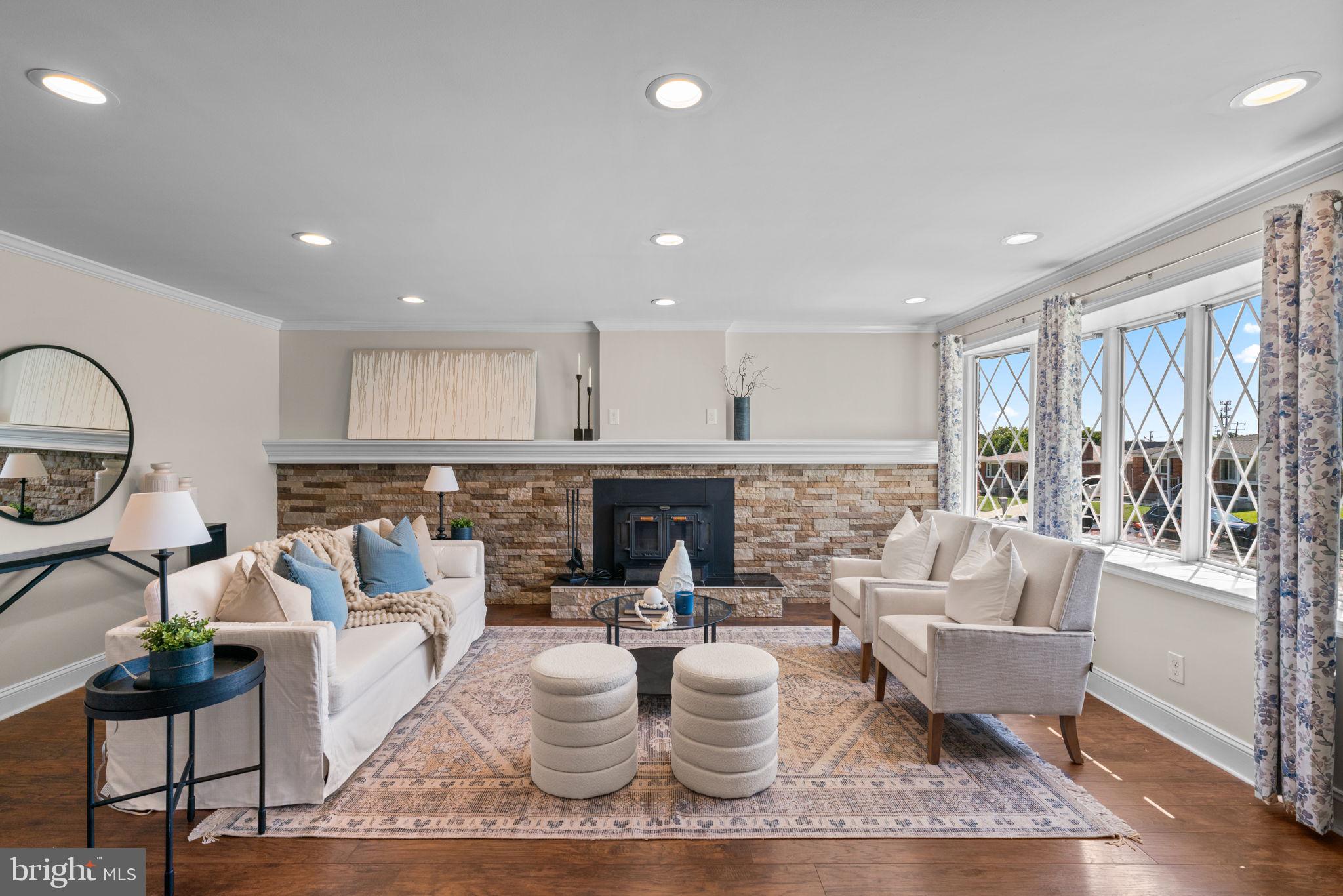 1221 Berkwood Road Baltimore, MD 21237 - Photo 4 of 34 a living room with furniture and a large window
