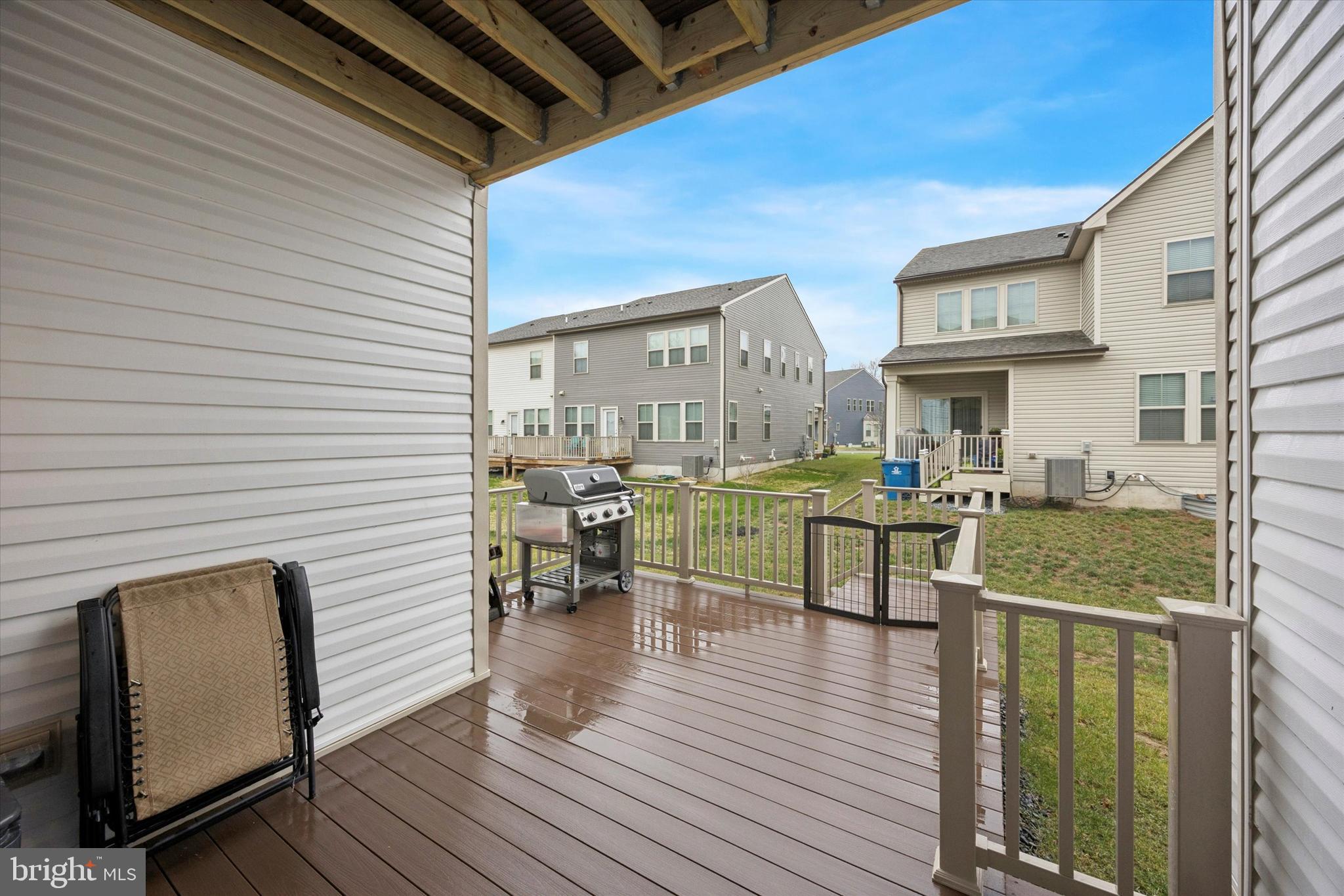 623 Liberty Ridge Road Horsham, PA 19044 - Photo 15 of 30 a view of a patio with table and chairs with wooden floor and fence