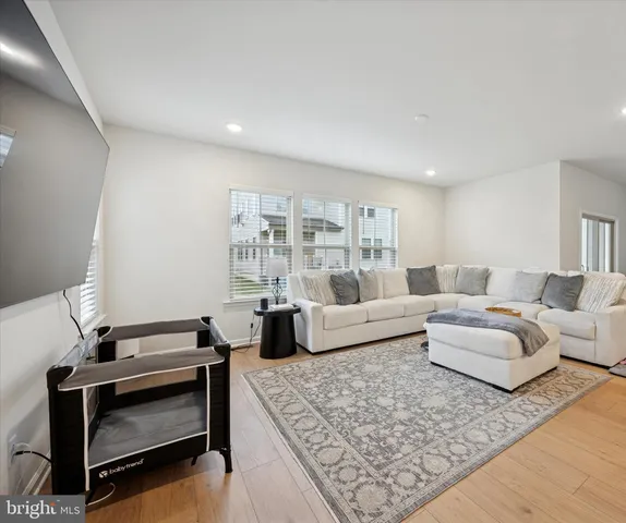 a living room with furniture and a couch