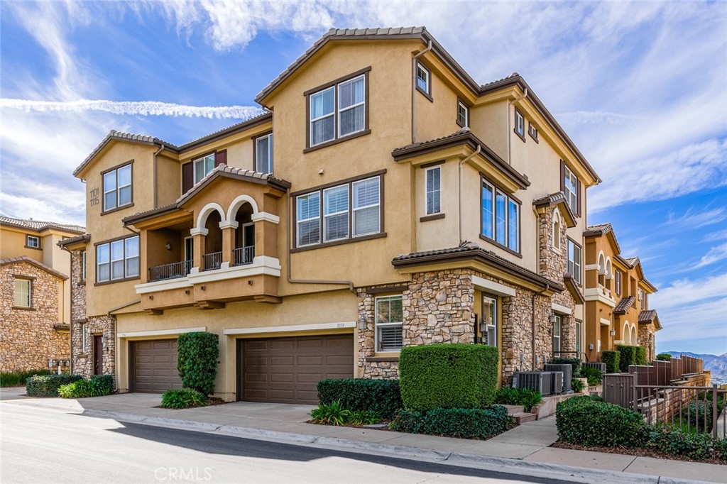 a view of a building with a yard