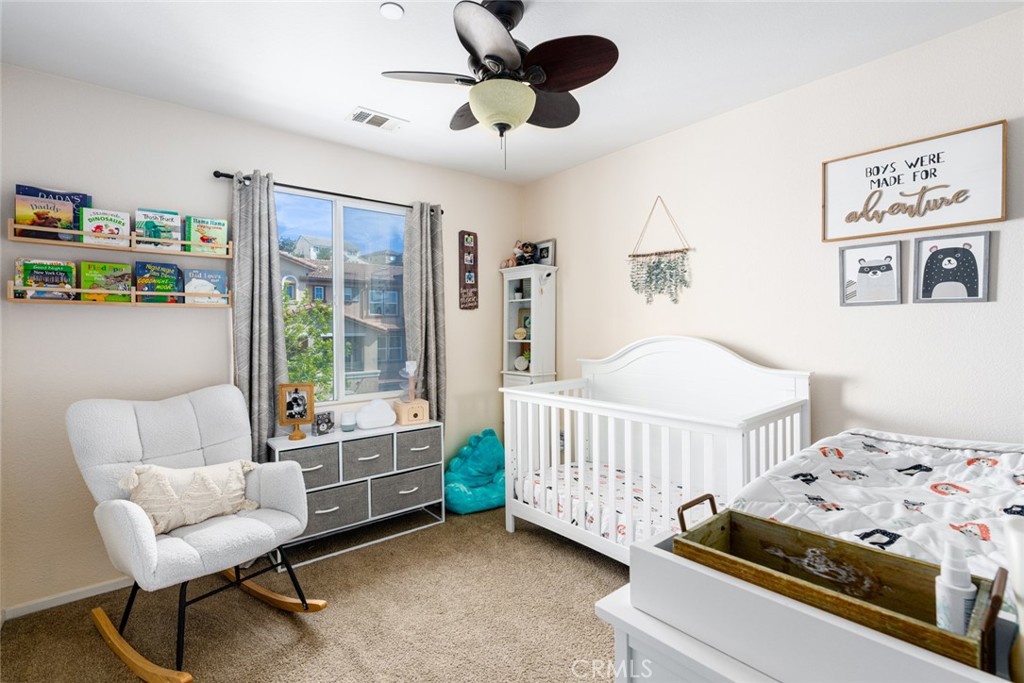 1113 Calabria Street Santee, CA 92071 - Photo 20 of 35 a bedroom with furniture and a window