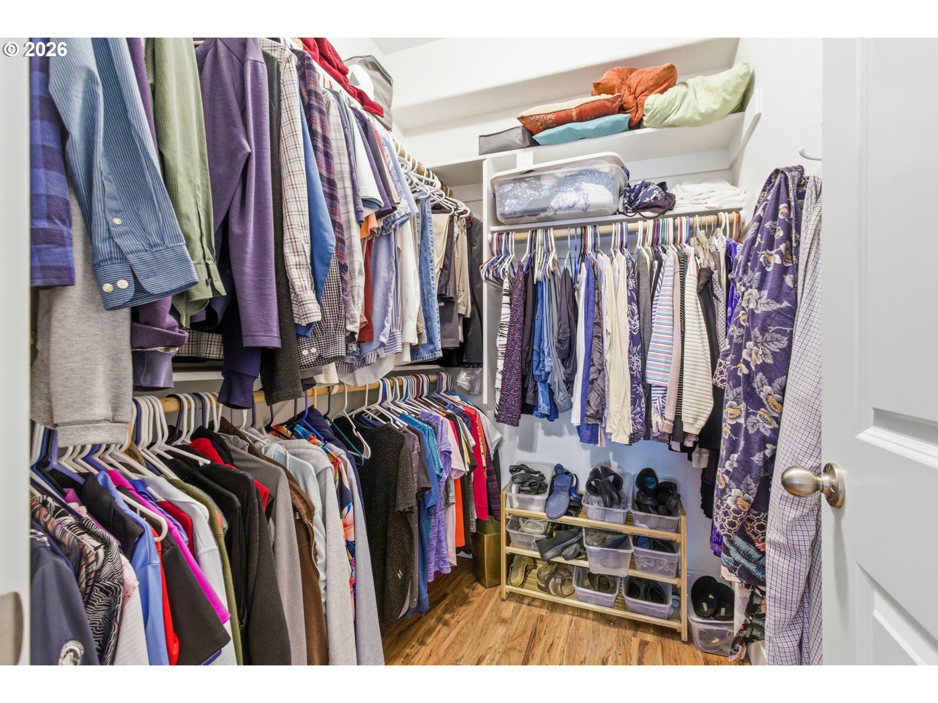 2418 Equestrian Loop South Salem, OR 97302 - Photo 22 of 39 a view of walk in closet with clothes and shoes