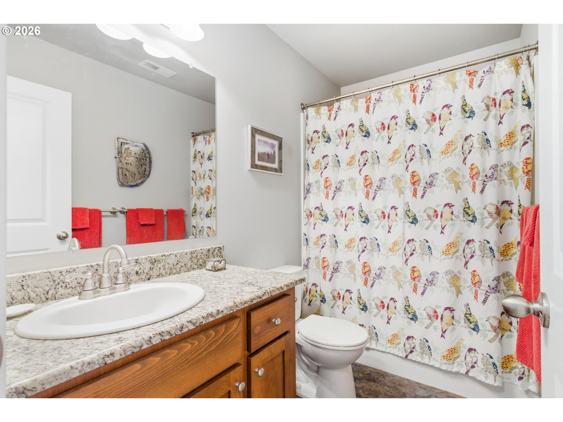 2418 Equestrian Loop South Salem, OR 97302 - Photo 27 of 39 a bathroom with a granite countertop sink and a mirror