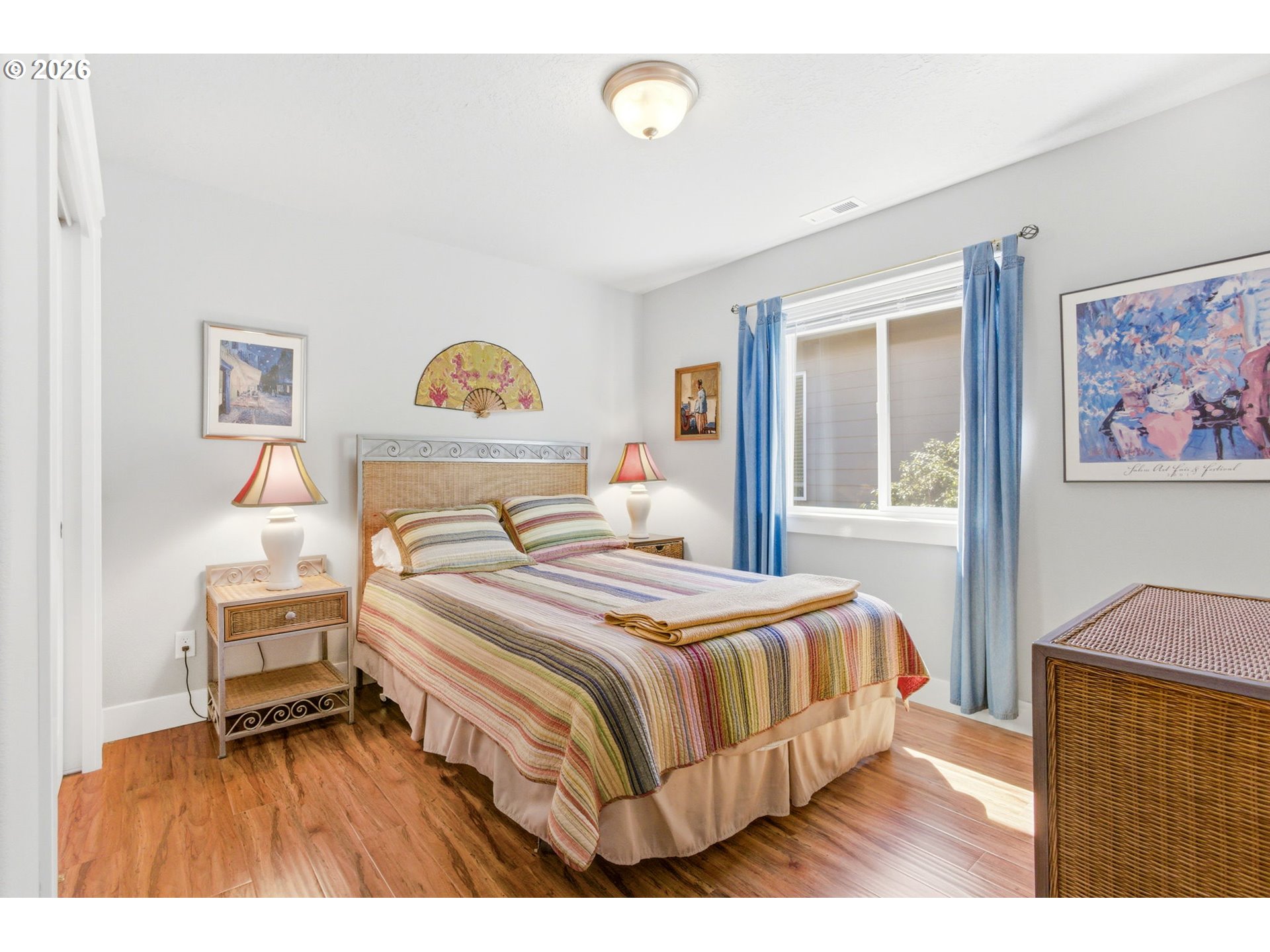 2418 Equestrian Loop South Salem, OR 97302 - Photo 28 of 39 a bedroom with a bed and a painting on the wall