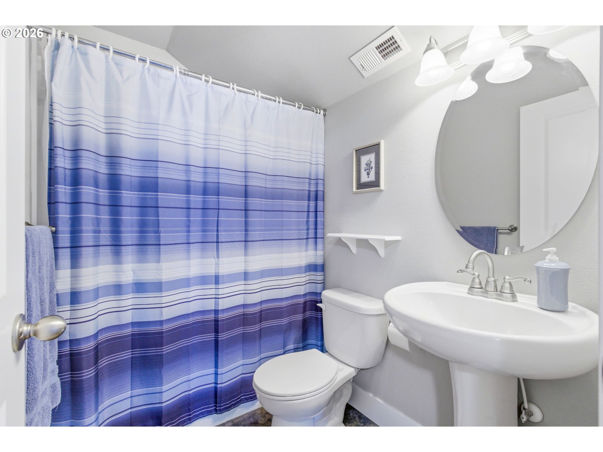2418 Equestrian Loop South Salem, OR 97302 - Photo 29 of 39 a bathroom with a sink toilet and mirror