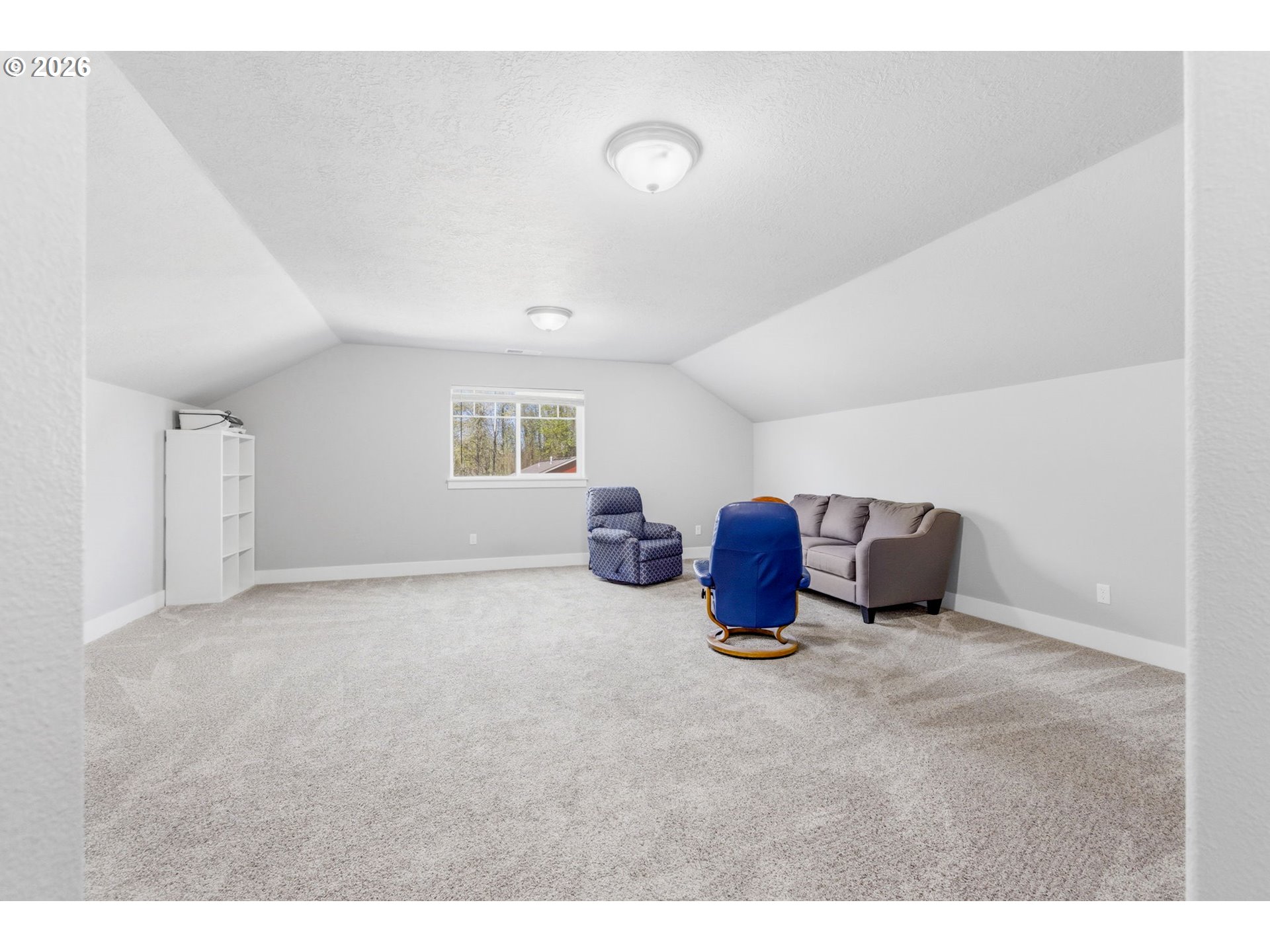 2418 Equestrian Loop South Salem, OR 97302 - Photo 32 of 39 a room with a table and a chair