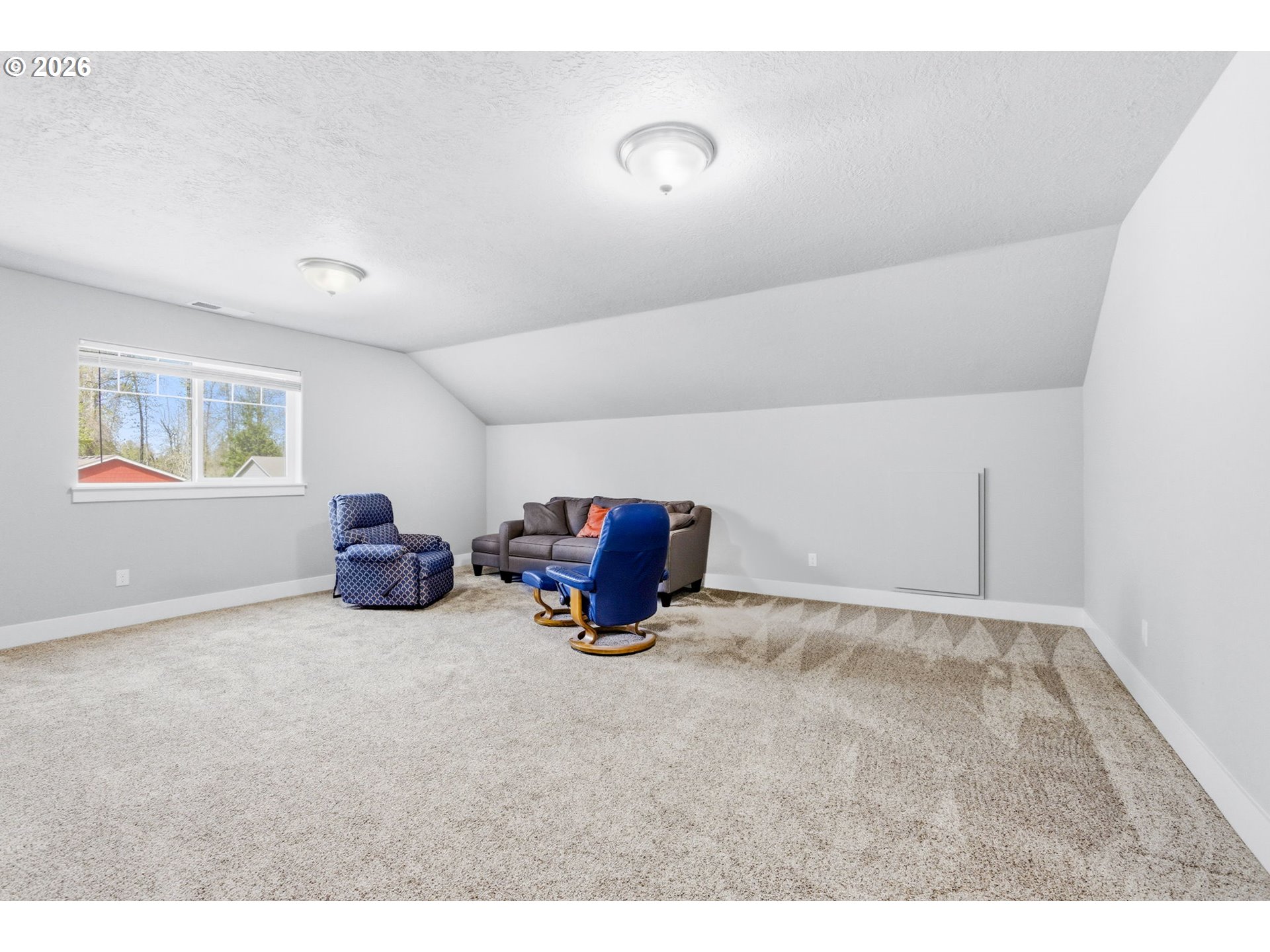 2418 Equestrian Loop South Salem, OR 97302 - Photo 33 of 39 a living room with furniture and a air conditioner vent