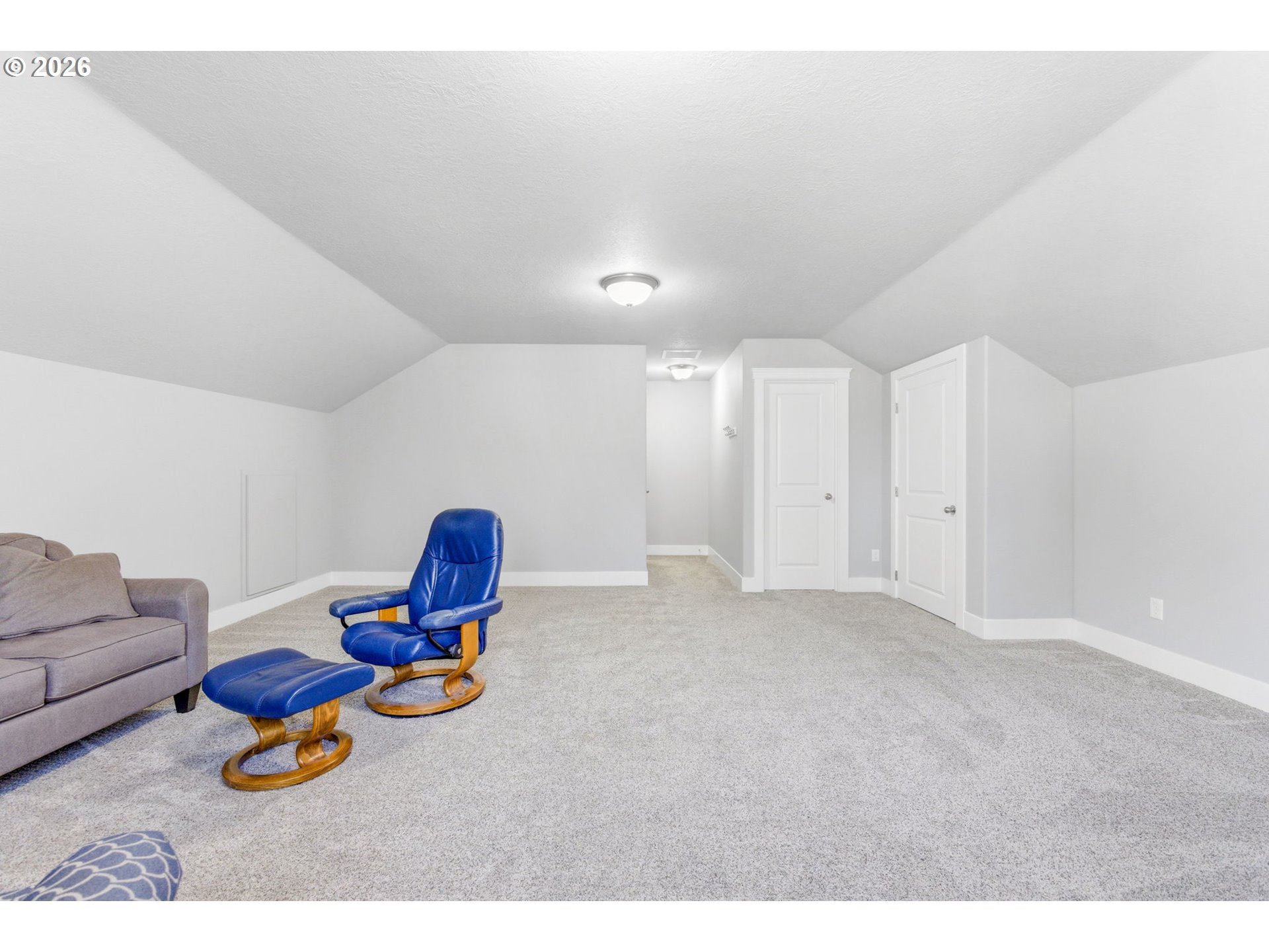 2418 Equestrian Loop South Salem, OR 97302 - Photo 34 of 39 a view of a room with furniture and wooden floor