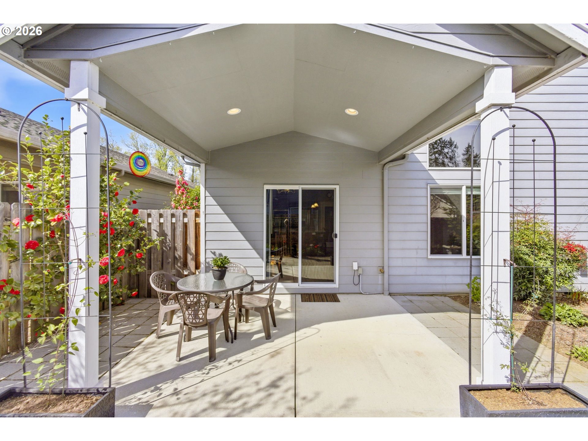 2418 Equestrian Loop South Salem, OR 97302 - Photo 35 of 39 a building outdoor space with patio furniture and potted plants