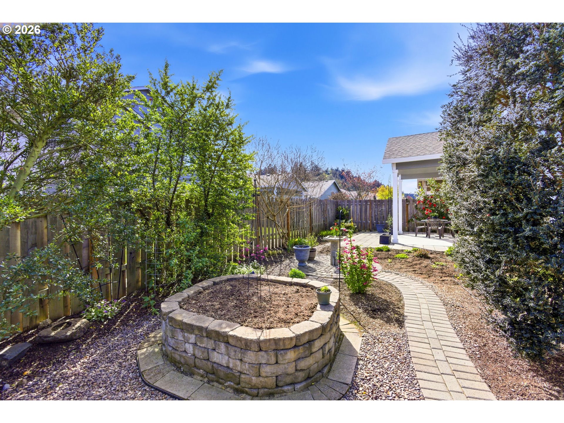 2418 Equestrian Loop South Salem, OR 97302 - Photo 39 of 39 a view of a backyard with sitting area