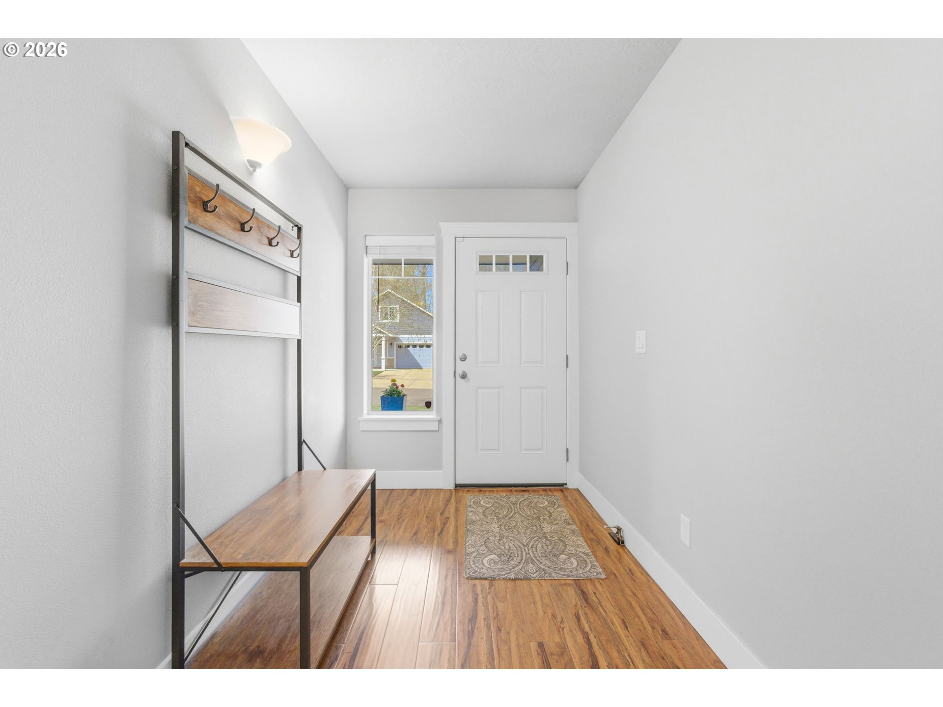 2418 Equestrian Loop South Salem, OR 97302 - Photo 6 of 39 a view of an empty room and wooden floor