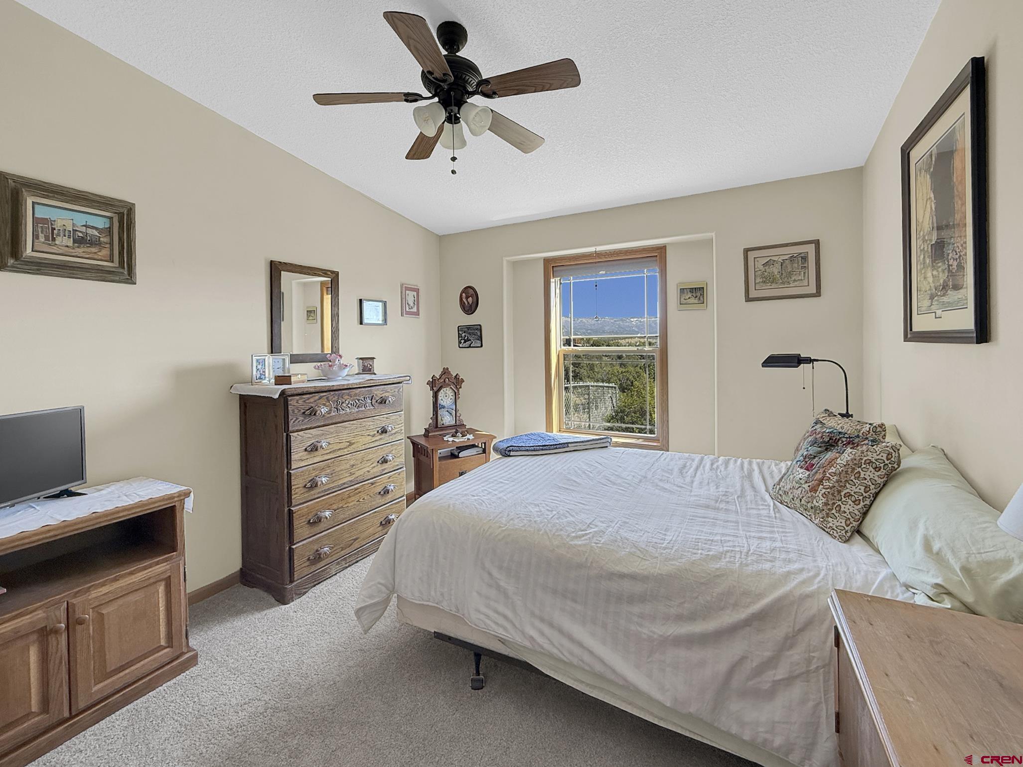 40331 D Road Crawford, CO 81415 - Photo 41 of 45 a bedroom with a bed and a cabinets